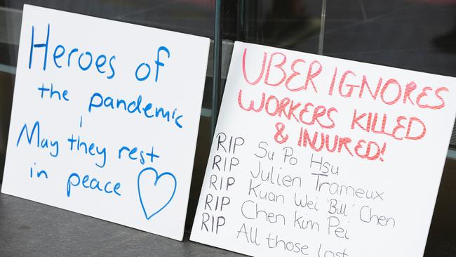 Signs posted at the vigil in Sydney on Wednesday. Picture: NCA NewsWire / Gaye Gerard