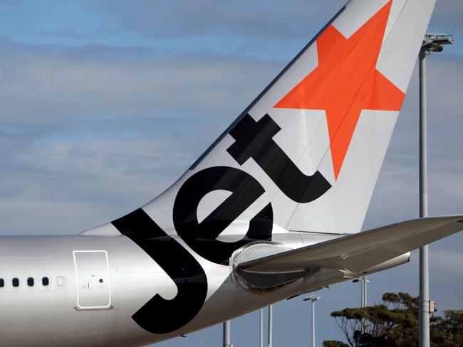 Generic Jetstar aircraft at Sydney airport. Jet star, plane.