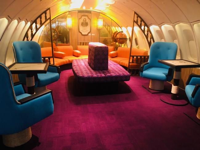 Qantas is giving flyers a taste of the groovy days of air travel, recreating the first class lounge that was part of its 747 aircraft in, the 1970s. Picture: Supplied