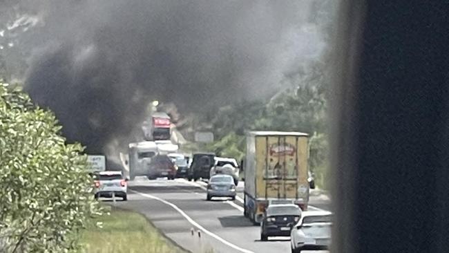 A motorhome has caught fire on the Bruce Highway, igniting a grassfire along the road. No one was injured and traffic has been delayed. Sunday, December 3, 2023. Picture: Summah Christopher (Facebook)