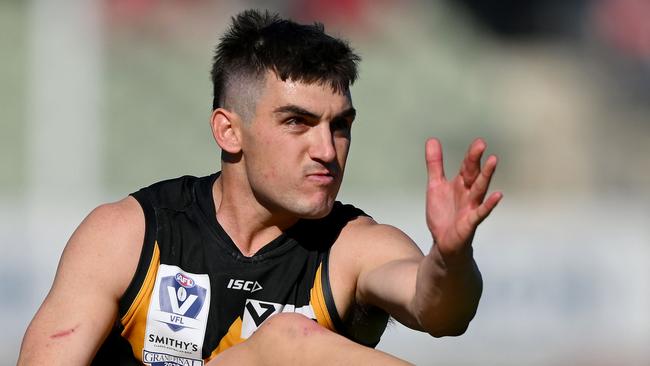 MELBOURNE, AUSTRALIA - SEPTEMBER 24: Shaun Mannagh of Werribee kicks the ball during the 2023 VFL Grand Final match between the Gold Coast SUNS and the Werribee Tigers at IKON Park on September 24, 2023 in Melbourne, Australia. (Photo by Morgan Hancock/AFL Photos via Getty Images)