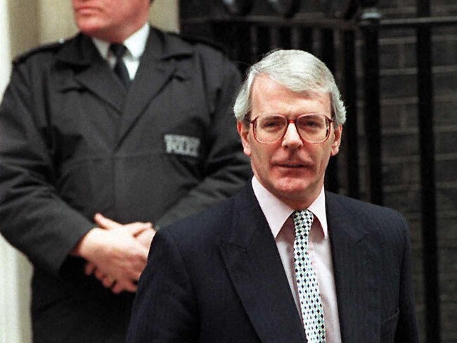 John Major leaves No 10 Downing Street in 1990 on his way to meet The Queen. Picture: AFP