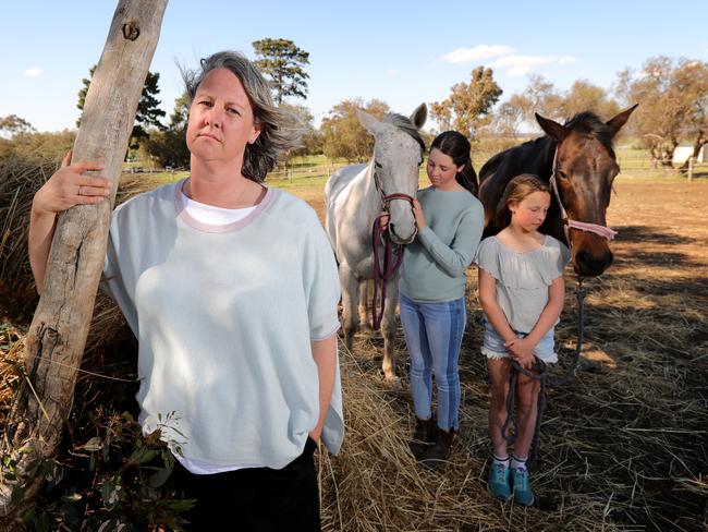 27/09/2018: Dimity Hirst with two of her daughters Bethany & Ruby & their horses 'Jenni' & 'Will'. The Hirsts had their Tasmanian farm business sold out from under them by the ANZ bank. Stuart McEvoy/The Australian.