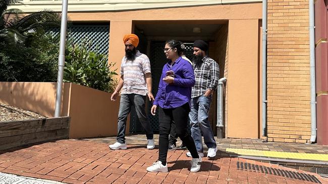 Lovepreet Singh, (in orange turban) with support leaving Lismore Courthouse.