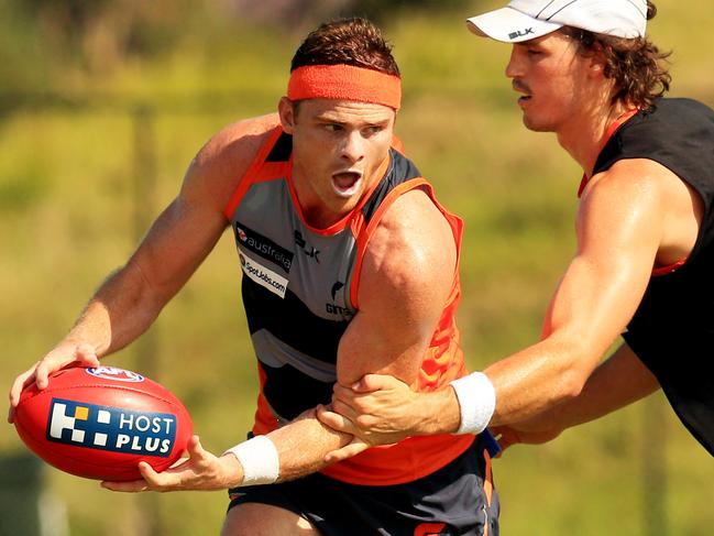 Heath Shaw trains in the heat at Greater Western Sydney Giants training at Sydney Olympic Park. pic Mark Evans