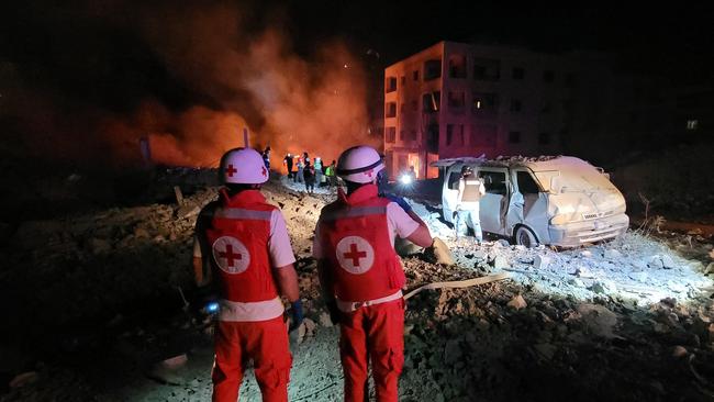 Responders arrive to the site of an Israeli airstrike that targeted the southern Lebanese village of Toul. Picture: Abbas Fakih