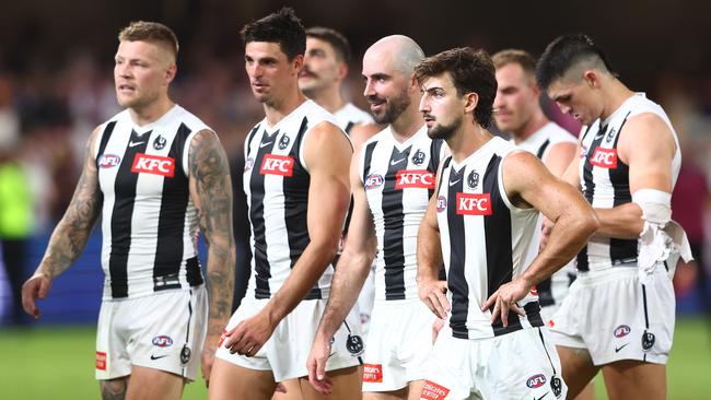 BRISBANE, AUSTRALIA - APRIL 06: Magpies leave the field after losing the round four AFL match between Brisbane Lions and Collingwood Magpies at The Gabba, on April 06, 2023, in Brisbane, Australia. (Photo by Chris Hyde/AFL Photos/via Getty Images )