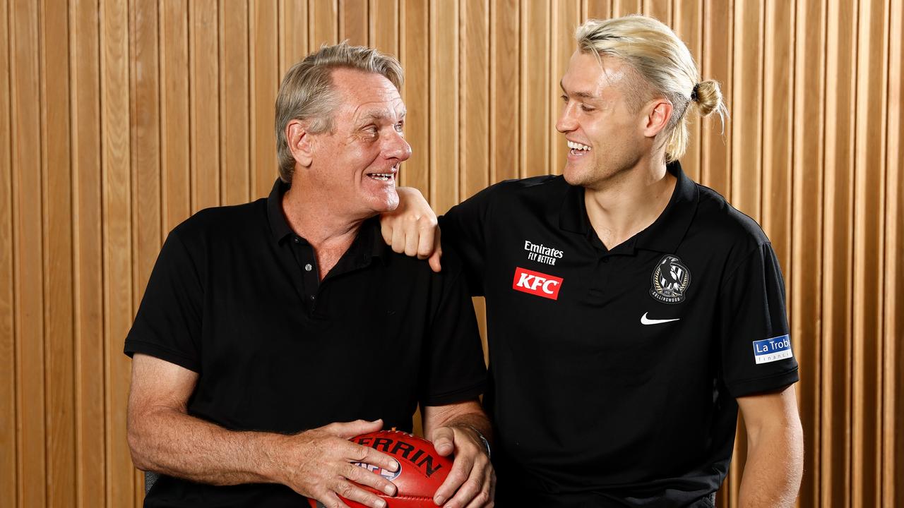 Father-son Magpies duo Peter and Darcy Moore. Picture: Michael Willson