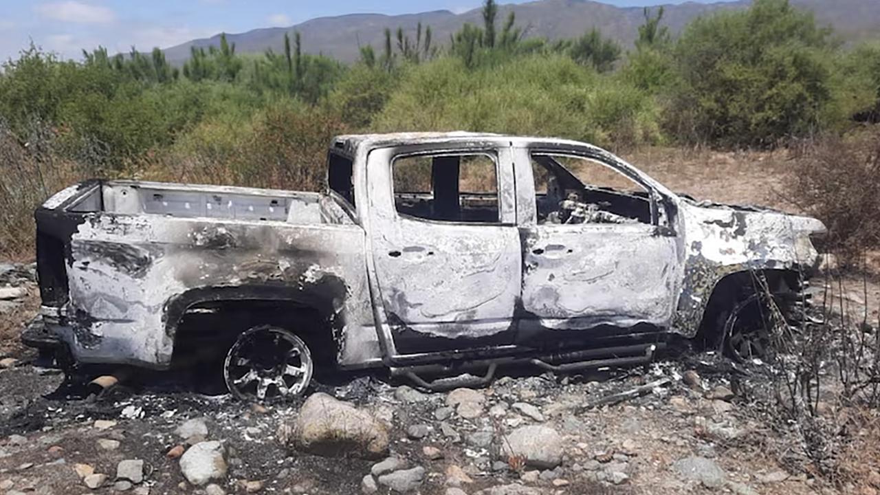 Mexican police make more arrests after Australian surfers Jake and Callum Robinson go missing. A burnt out car at a ranch several kilometres from the search site. it is believed to have belonged to the missing men. (Supplied)