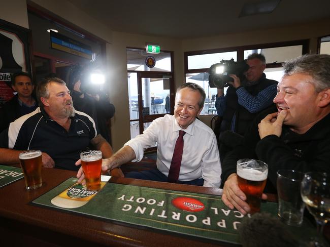 Labor leader Bill Shorten has a beer with Beaconsfield Mine disaster survivors Todd Russell and Brant Webb at the Beauty Point Waterfront Hotel. Picture: Chris Kidd