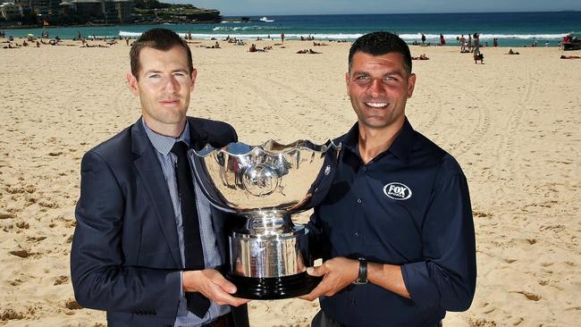  Brett Emerton and John Aloisi with the Asian Cup trophy at Bondi Beach , Bondi .Picture Gregg Porteous 