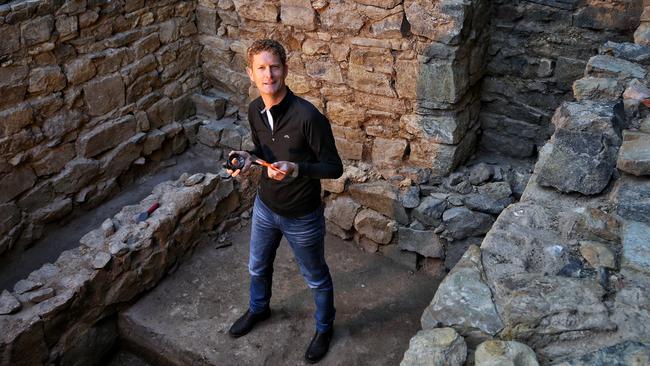 Archaeologist Jeremey Smith at the excavation site. Picture: Hamish Blair