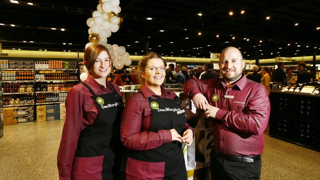 At the opening of Dan Murphy's, New Town is staff (L-R) Shell, Sarah and store manager, Sam.Picture: MATT THOMPSON