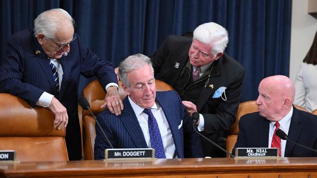 House Ways and Means Committee Chairman Rep. Richard Neal (D-MA), centre, talks with other ranking members before a House Ways and Means Committee hearing to discuss tax returns from former US President Donald Trump and whether to make them public. Picture: AFP.