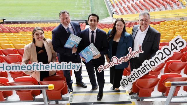 Queensland Tourism Industry Council’s Natassia Wheeler, Tourism Minister Andrew Powell, Premier David Crisafulli, Amy Gash from Lady Elliot Island and Tourism and Events Queensland CEO Craig Davidson at Suncorp Stadium. Picture: Josh Woning