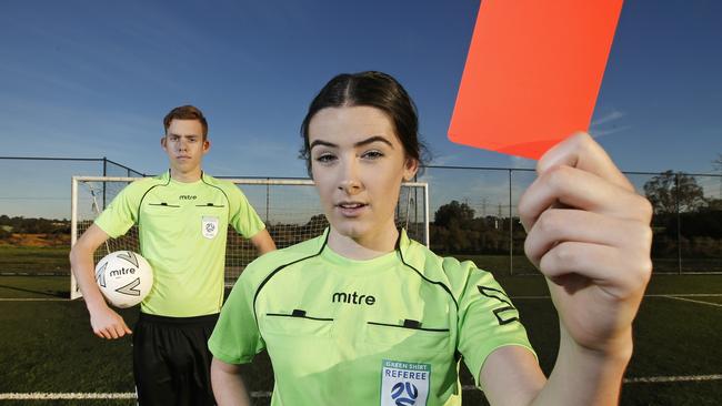 Junior referees such as Nicholas Tubby, 17, and Madeleine Dodd, 19, will report abusive behaviour using an app. Picture: David Caird