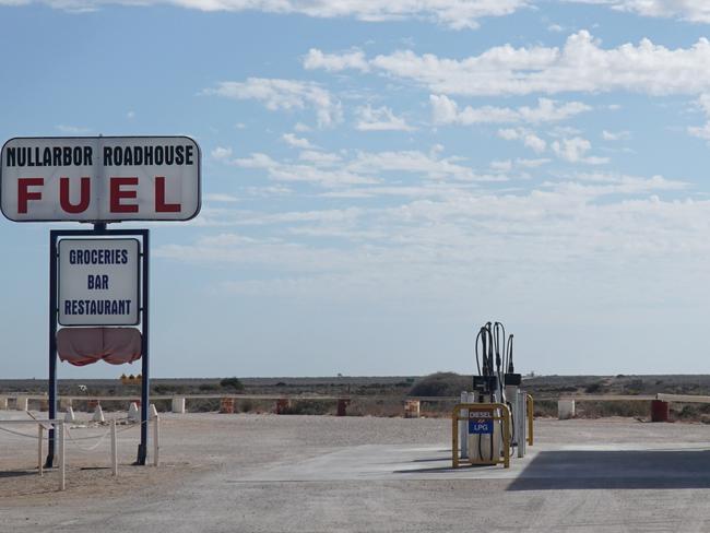 picture shows a part of a roadhouse at the Nullarbor Plain, fuel station and sign