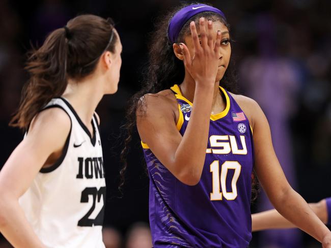 Angel Reese makes a “you can’t see me” gesture to Caitlin Clark. Picture: Maddie Meyer/Getty Images