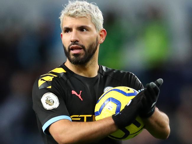 BIRMINGHAM, ENGLAND - JANUARY 12: Sergio Aguero of Manchester CIty celebrates victory with the match ball after he scored a hat-trick during the Premier League match between Aston Villa and Manchester City at Villa Park on January 12, 2020 in Birmingham, United Kingdom. (Photo by Catherine Ivill/Getty Images)