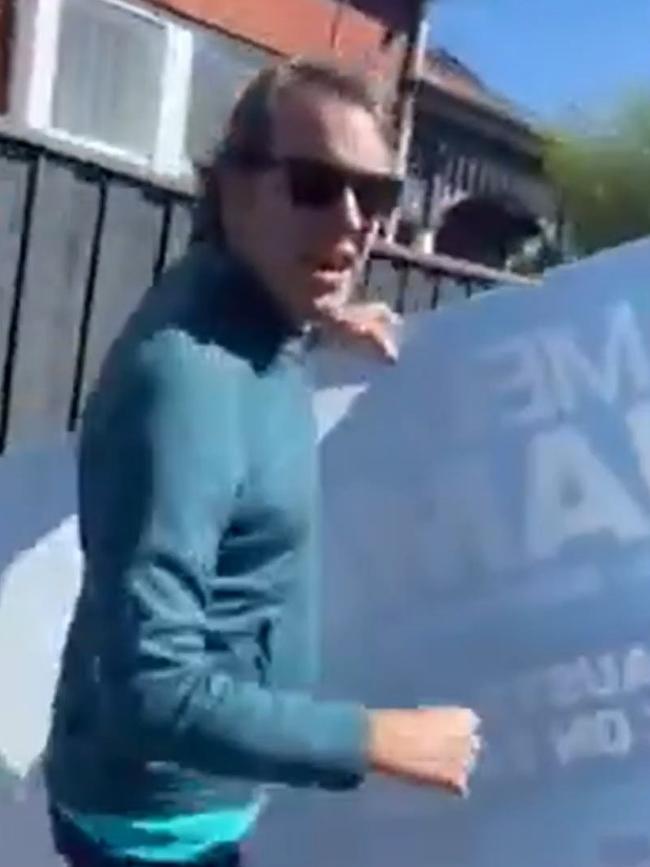 Peter Jordan, Monique Ryan’s husband, was filmed pulling down a rival candidate’s poster. Picture: Supplied