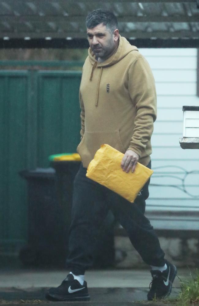 Daniel Bigliotto leaves a South Western Sydney home today while on bail. Picture: John Grainger