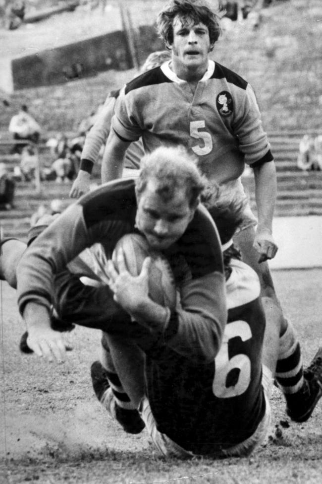 Norths' Peter Hall runs into Redcliffe’s Rod Halley in a 1972 clash at Lang Park.