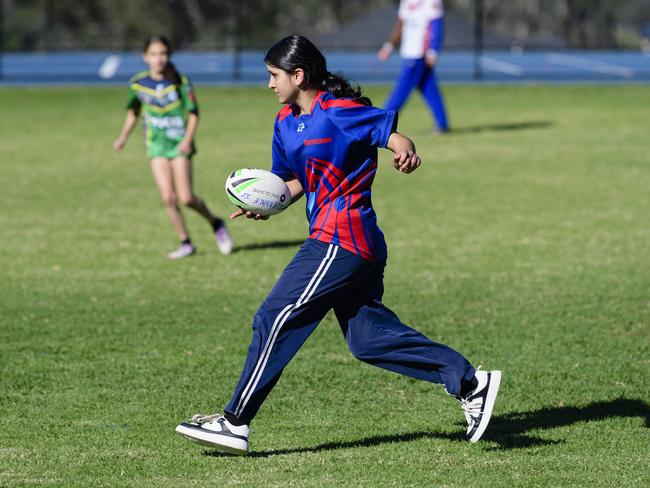 Arwa on the move for Harristown State School Red in the inaugural Primary Interschools Reconciliation Touch Carnival hosted by Glenvale State School, Wednesday, May 28, 2025. Picture: Kevin Farmer