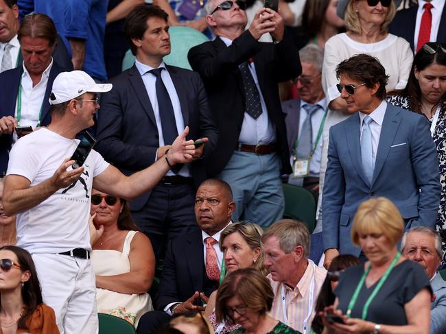 An excited spectator interacts with Tom Cruise in the Royal Box. Picture: Getty Images