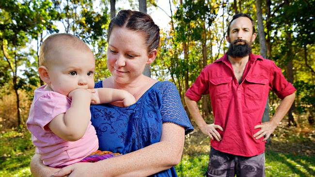 Katie Noble with 10-month-old daughter Temperence and husband Shaun Noble after their ‘disastrous’ wedding at Lake Bennett. Picture: Michael Franchi