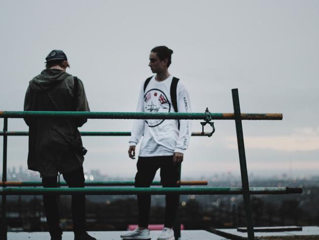 Two of the men on the roof. Picture: Alfie Nevin