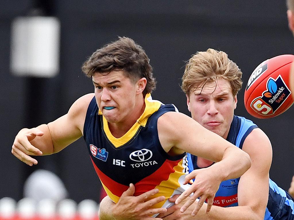 30/03/19 - SANFL: Sturt v Adelaide at Unley Oval.  Sturt's Sam Colqhoun tackles Adelaide's Ned McHenry. Picture: Tom Huntley