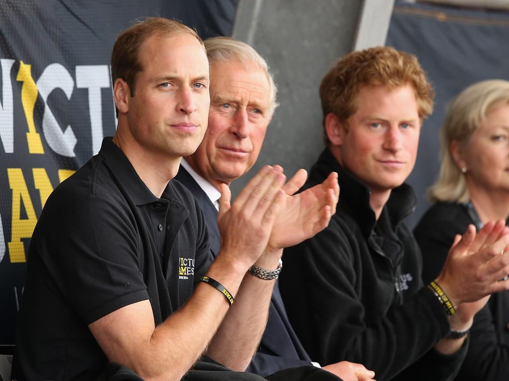 Prince William, with his father and brother in 2014, was furious that their private difficulties had been aired. Picture: Getty Images