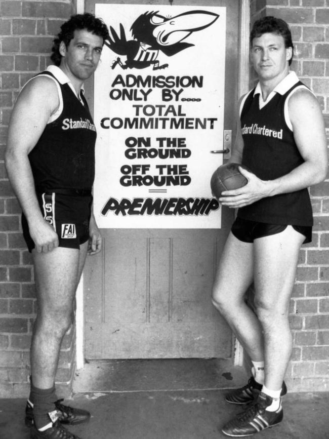 Mark Williams and Bruce Abernethy at the entrance to the Port Adelaide change rooms in 1990. 