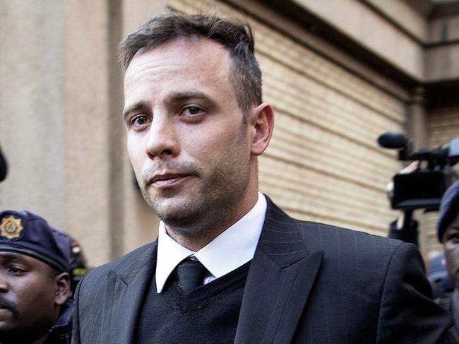 South African Paralympian Oscar Pistorius leaves the Pretoria High Court on June 15, 2016, after the third day of his resentencing hearing for the 2013 murder of his girlfriend Reeva Steenkamp. Oscar Pistorius will be sentenced on July 6 for the murder of his girlfriend Reeva Steenkamp, the judge in the High Court in Pretoria said Wednesday at the end of a three-day court hearing. / AFP PHOTO / GIANLUIGI GUERCIA