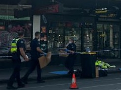 Police at the scene where a man was stabbed on Chapel St. Picture: X