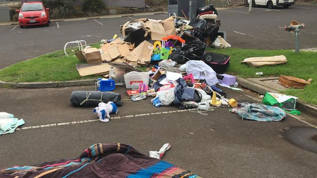 The rubbish dumped at Whatmough Park keeps piling up, with beds and old boxes outside a sporting goods donation drop off point.