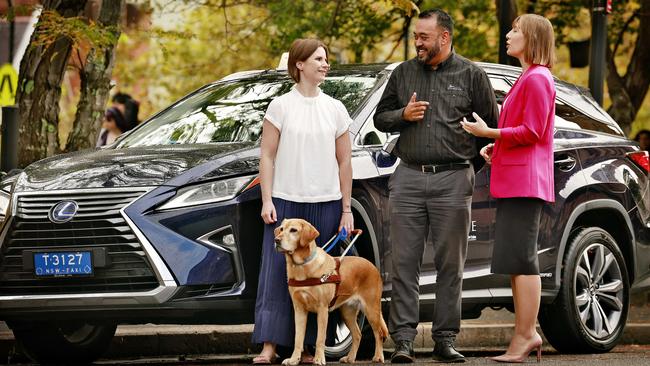 Sarah Hirst and Zali with taxi driver Shawon Bar and NSW Transport Minister Jo Haylen. Picture: Sam Ruttyn