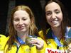 Daughter of swimming great pulls off stunning triple gold