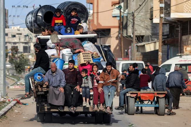 Some families were already starting to dismantle tents and gather their belongings to flee Rafah