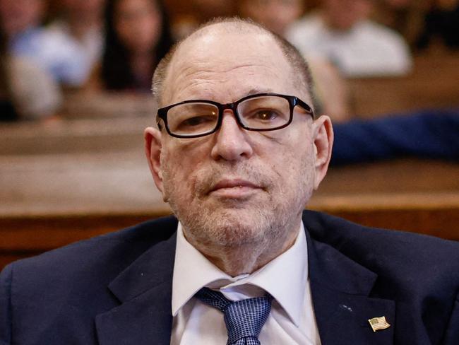 (FILES) Former film producer Harvey Weinstein appears in Manhattan Criminal Court for a pretrial hearing, following his overturned sex crimes conviction, in New York City, July 19, 2024. Former Hollywood movie producer and convicted sex offender Harvey Weinstein was hospitalized after an "alarming blood test result," his lawyer said late December 2, 2024. Weinstein's attorney Imran Ansari told AFP via email that the 72-year-old was taken to a New York hospital for "emergent treatment due to an alarming blood test result that requires immediate medical attention." (Photo by KENA BETANCUR / POOL / AFP)