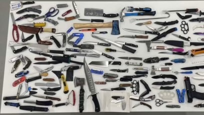 An array of knives and other weapons seized during police operations targeting youth knife crime in Queensland. Picture: Supplied / Brett Beasley