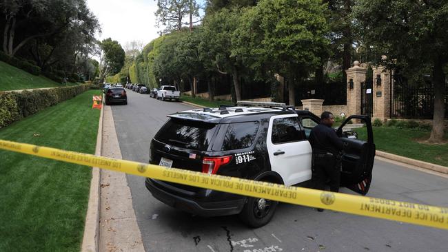 Police cars block a street outside the home of Combs in March. Picture: AFP