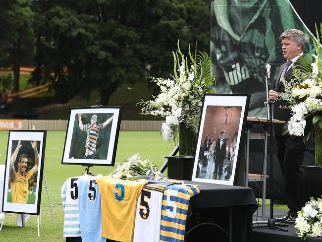 A line-up of the shirts he played in during his illustrious career and framed images of some of his most treasured moments — in and out of the jerseys. Picture: Getty Images