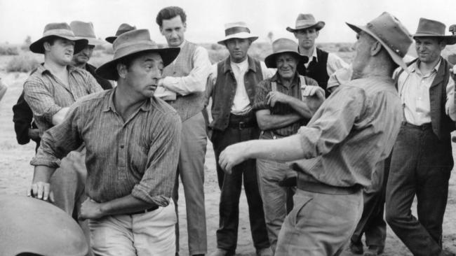 American actor Robert Mitchum (left) in a fight scene in The Sundowners, which was filmed at Corraberra station, Port August, in November 1959.