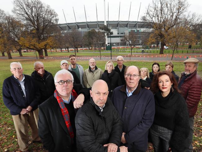 Angry residents protesting agains the development of the parklands next to the MCG. [four up front:] Stuart Hamilton, Greg Bisinella and Ian Mitchell [president of the East Melbourne Group], and Anita Steinbarth. Picture: Alex Coppel