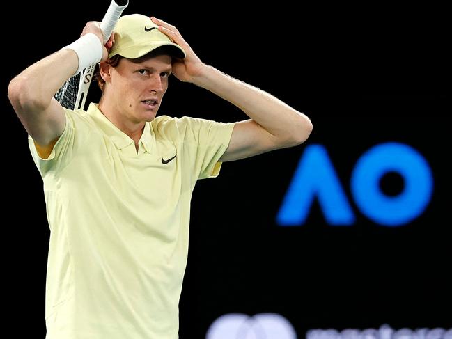 Italy's Jannik Sinner celebrates the match point against Germany's Alexander Zverev during their men's singles final match on day fifteen of the Australian Open tennis tournament in Melbourne on January 26, 2025. (Photo by Martin KEEP / AFP) / -- IMAGE RESTRICTED TO EDITORIAL USE - STRICTLY NO COMMERCIAL USE --