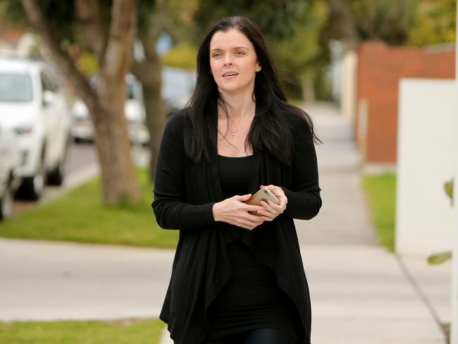 Amber Harrison makes a statement outside her home, after a court ordered her to pay Channel 7's legal fees. Picture: Stuart McEvoy/The Australian