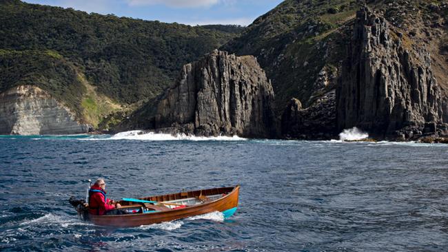 Adrian Dale on a circumnavigation of Bruny Island using a Huon pine Clinker Dinghy and a 1974 model WSPC Silver Century seagull outboard 4.4hp. Picture supplied by RICHARD BENNETT