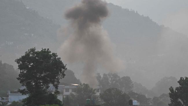 Smoke rises in the main town of Poonch district after India’s attack. Picture: AFP