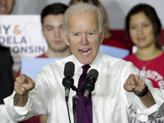 Former Democratic Vice President Joe Biden speaks during a rally with Wisconsin Democrats on the University of Wisconsin-Madison Campus, Tuesday Oct. 30, 2018, in Madison Wis. Biden called for more civility and dignity in politics during a rally, offering a sharp rebuke of President Donald Trump while telling the students they can "own" next week's election if they vote.  (Steve Apps/Wisconsin State Journal via AP)